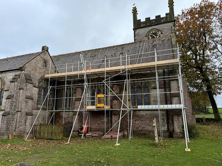 Church roof works with the elevation fully scaffolded
