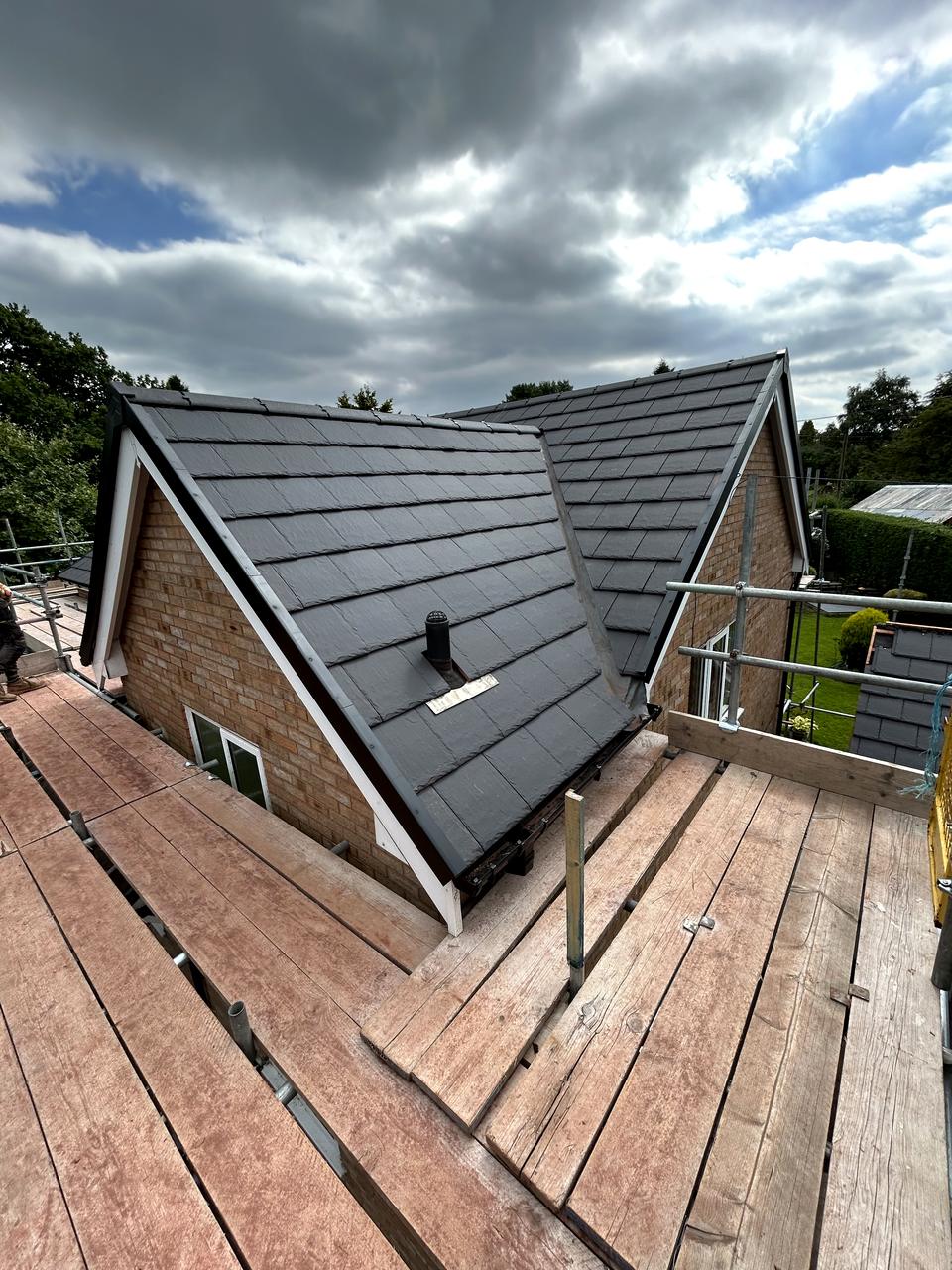 New natural slate to gables and dormer cheeks
