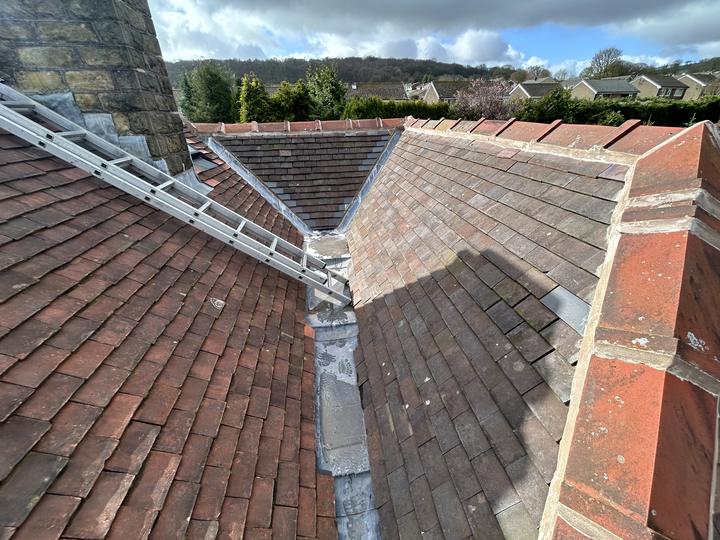 Clay plain tile roof with new lead valleys
